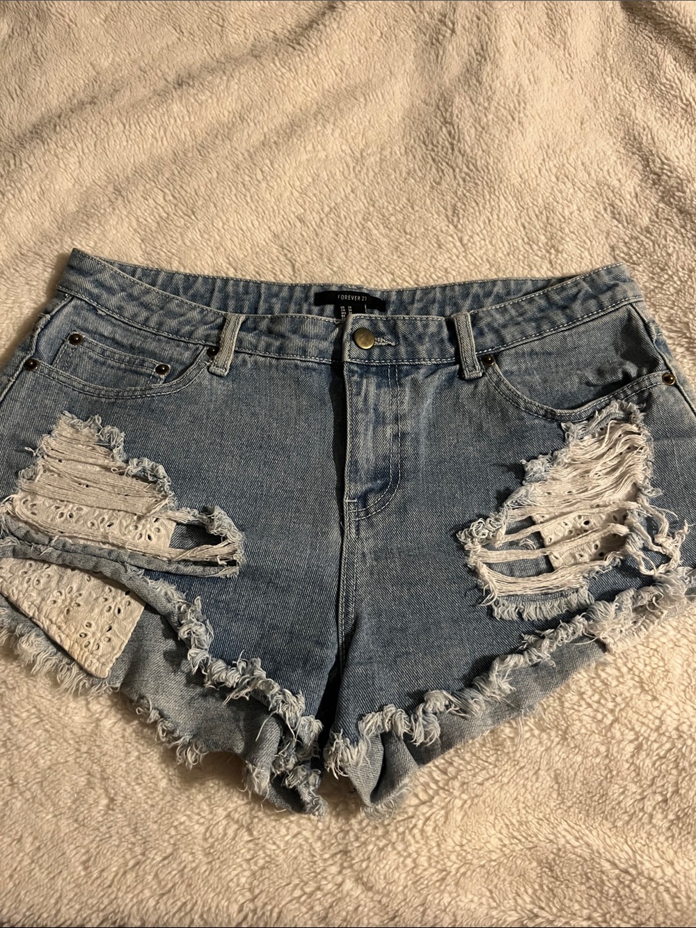 Forever 21 Distressed Light Blue Denim Cutoff Shorts with Eyelet Insets